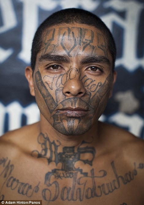 2C05BBB800000578-3224098-Members_of_the_notorious_Mara_Salvatrucha_gang_show_off_their_fa-a-7_1441626518780.jpg